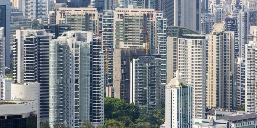 Aerial view of crowded Singapore highrise apartment skyscraper buildings